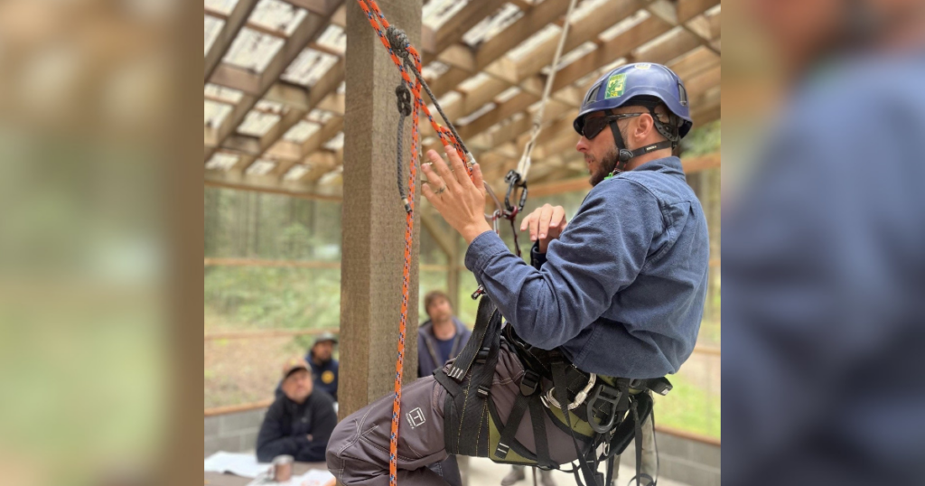 Kevin Myers demonstrates arborist climbing and rope techniques during an ACRT Arborist Training class.